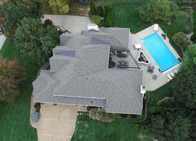 Aerial view of a completed roof replacement in Jefferson City, Missouri